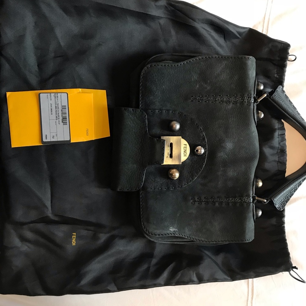 Authentic Fendi handbag with dust bag.